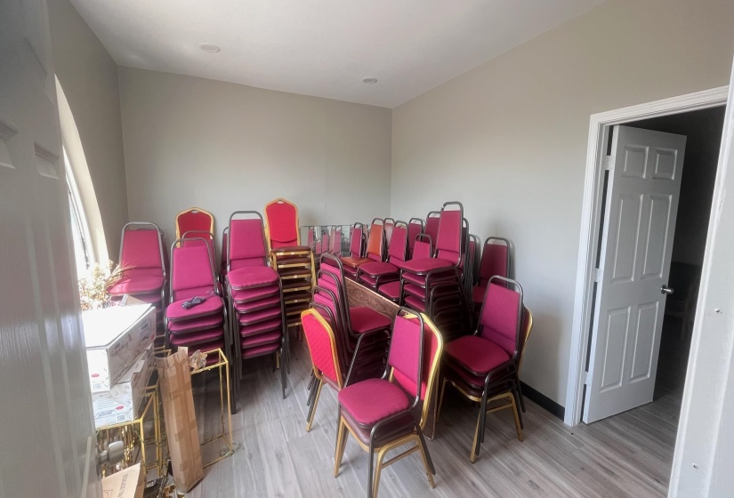 Miscellaneous room featuring light wood finished floors and baseboards