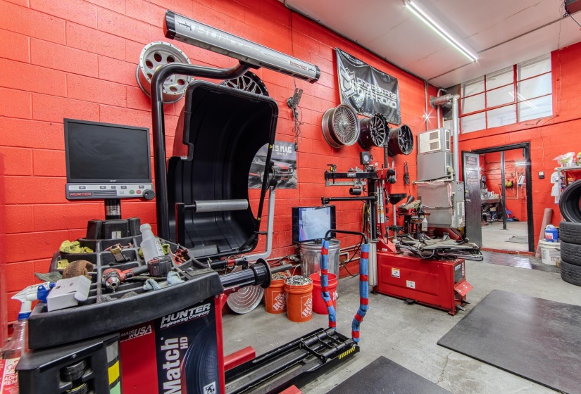 Garage featuring a workshop area