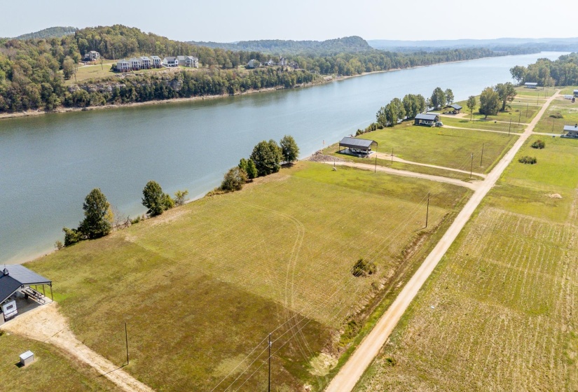Aerial view of sparsely populated area featuring a large body of water