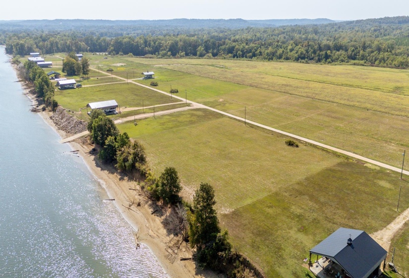 Overview of rural landscape with a nearby body of water