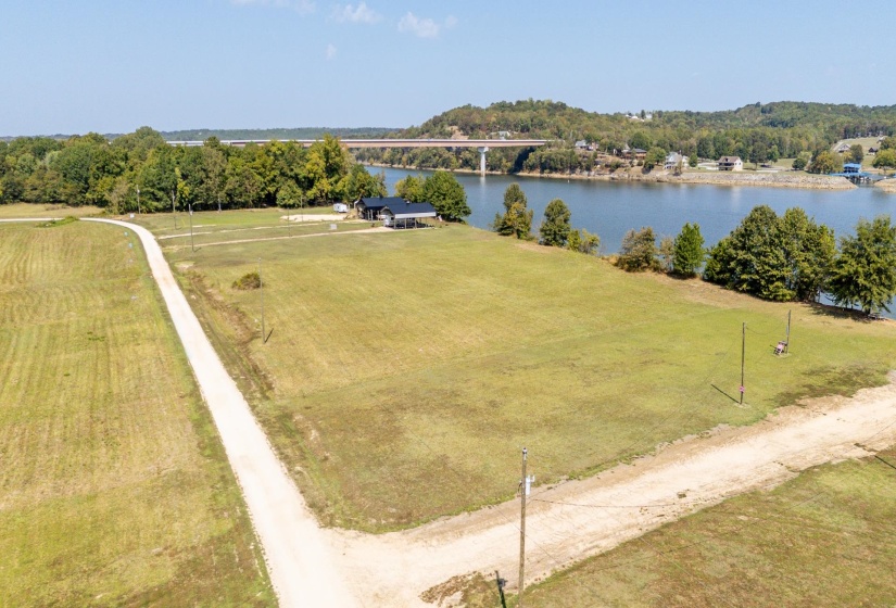 Aerial view of a large body of water and a notable bridge