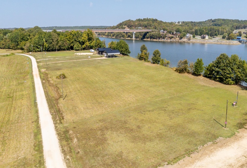 Aerial view of a large body of water and a notable bridge