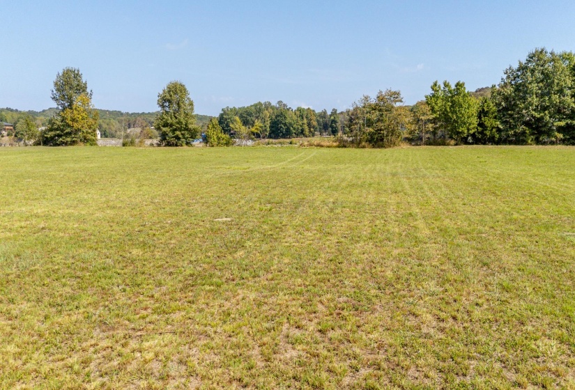 View of grassy yard with a view of countryside