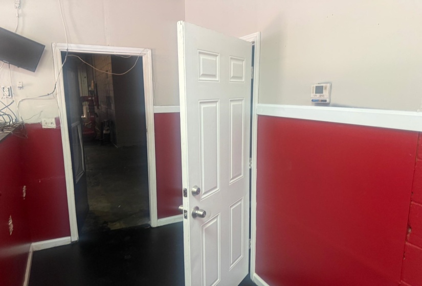 Hall featuring baseboards