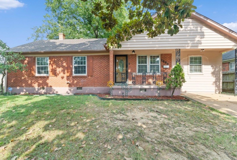 View of front of property with crawl space, brick siding, a front yard, and a porch