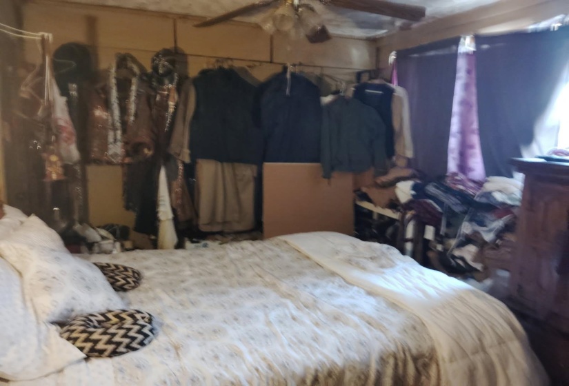 Bedroom featuring a ceiling fan