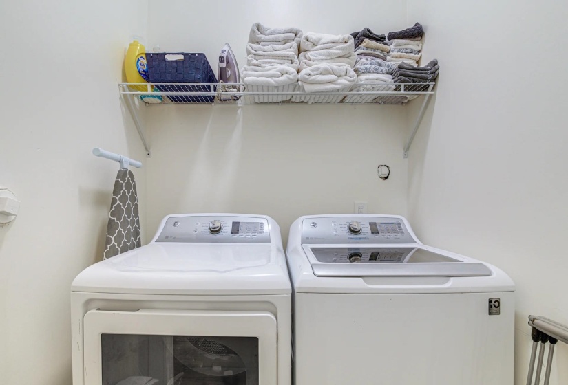 Laundry room featuring washing machine and clothes dryer