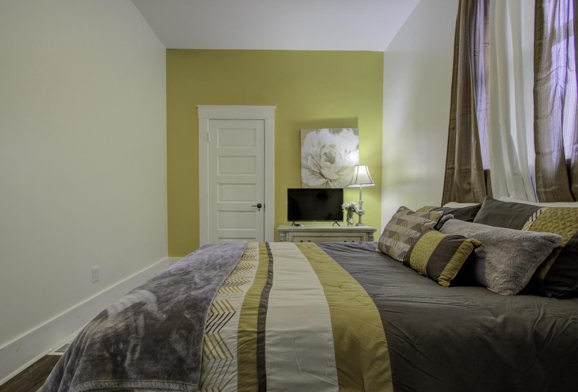 Bedroom with baseboards