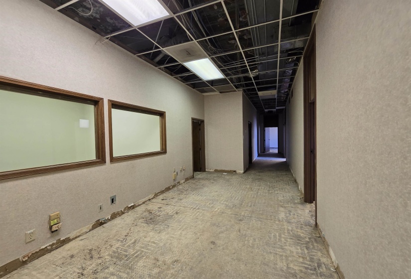 Hall featuring a textured wall