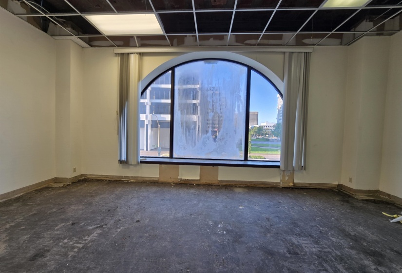 Unfurnished room featuring baseboards