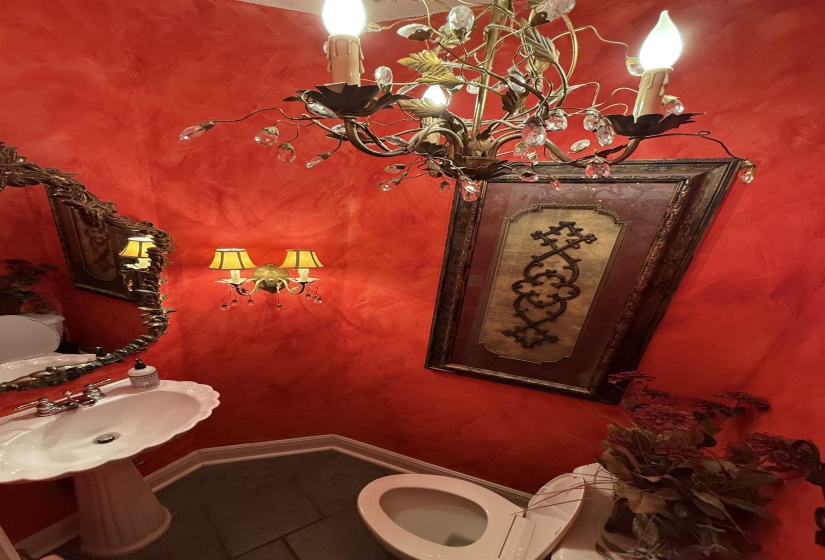 Bathroom with toilet and tile patterned floors