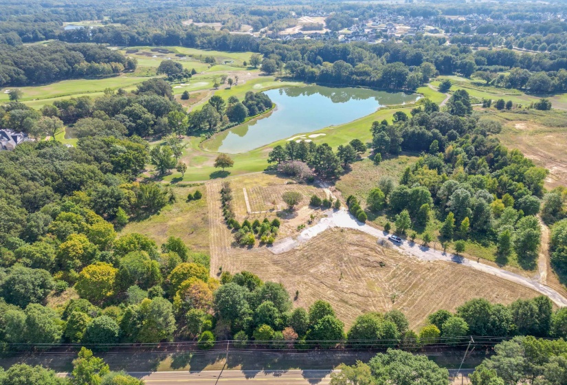 Discover the perfect spot for your dream home on 1.98 acres of prime land along the Spring Creek Golf Course.