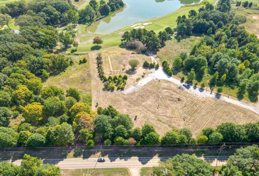 Birds eye view of property overlooking the golf course.
