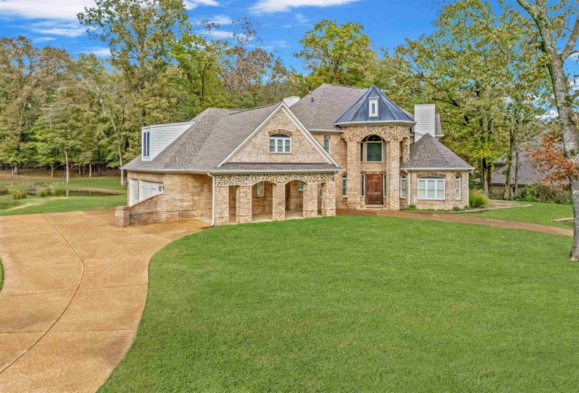 View of front of house with a front yard
