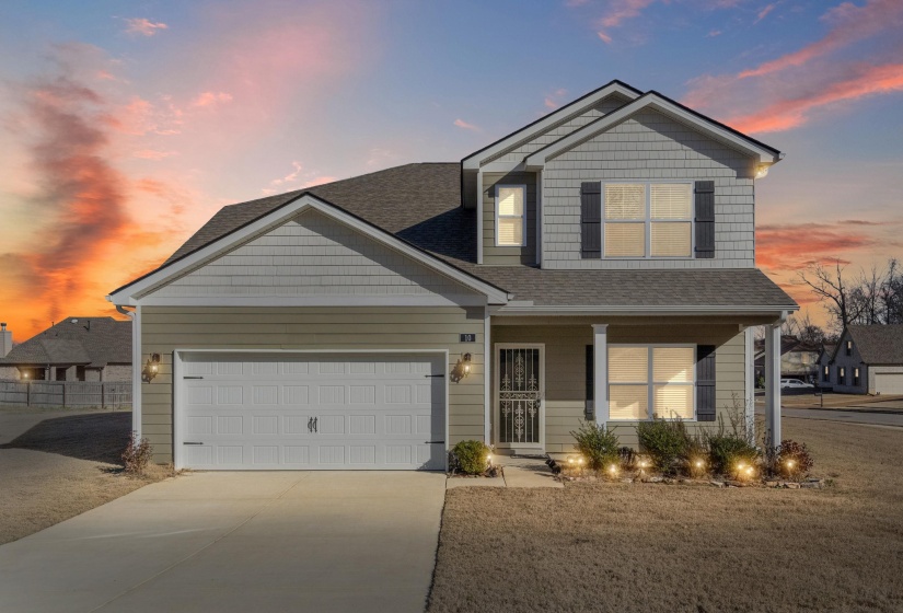 Craftsman house with a porch, concrete driveway, an attached garage, and a shingled roof
