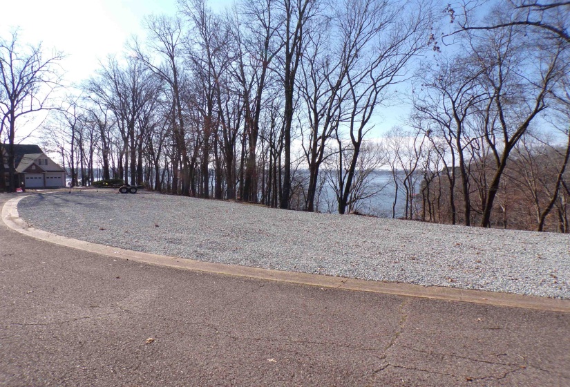 The new owner will own 1/6 of lot across street for extra parking.