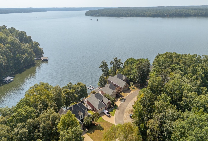Bird's eye view of a large body of water and a heavily wooded area