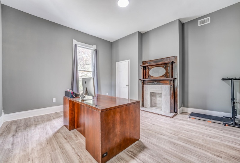 Office space with light wood-style floors