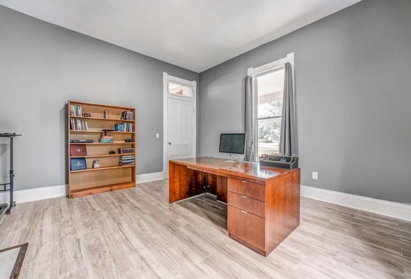 Office space with light wood-type flooring