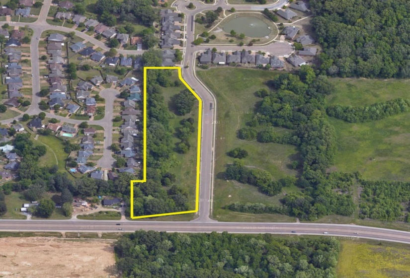 Birds eye view of property with a residential view