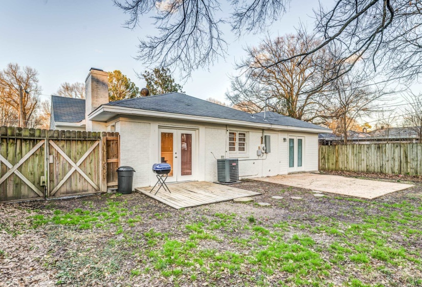 Rear view of property with central air condition unit, a patio area, and french doors