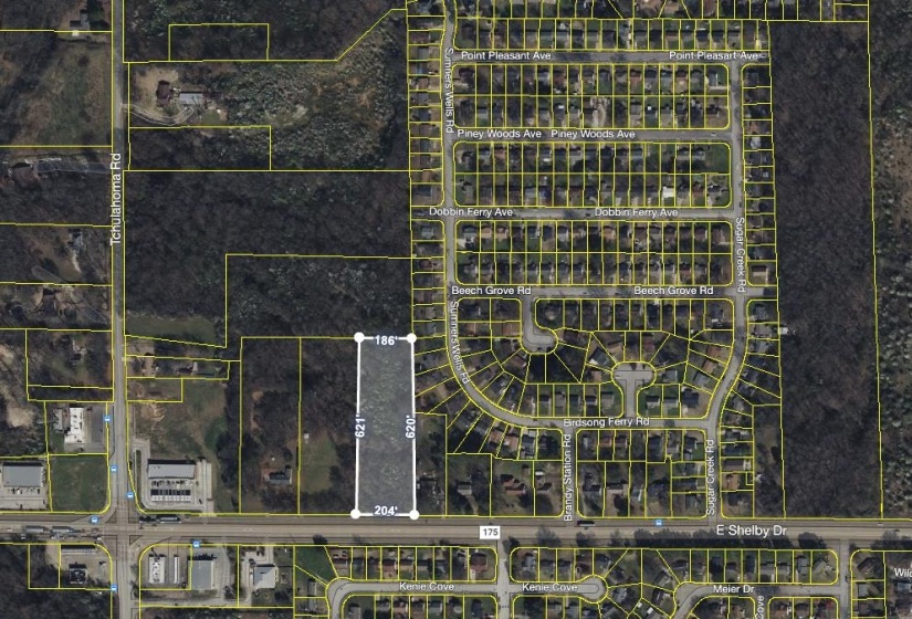 Aerial overview of property's location featuring property parcel outlined