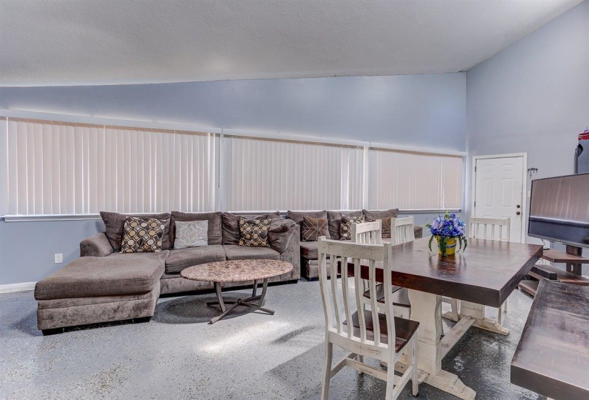 Living area with lofted ceiling