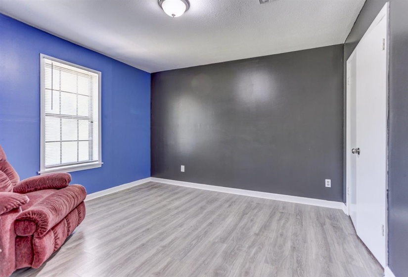 Living area with light wood-style flooring