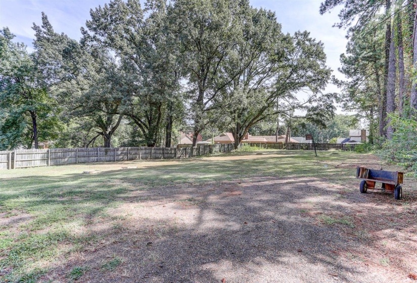 View of yard featuring view of wooded area