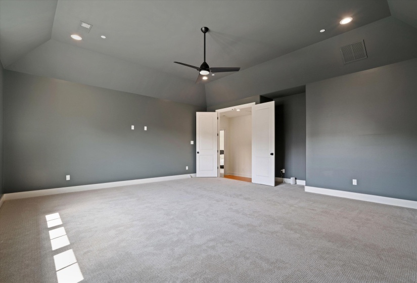 Media Room with lofted ceiling, light colored carpet, recessed lighting, and ceiling fan