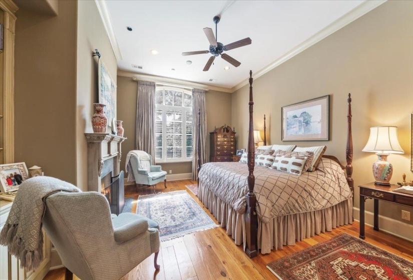Bedroom with hardwood / wood-style floors, crown molding, ceiling fan, and recessed lighting