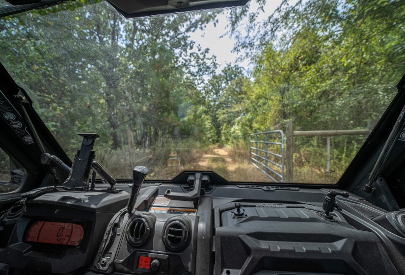 View of yard with view of wooded area