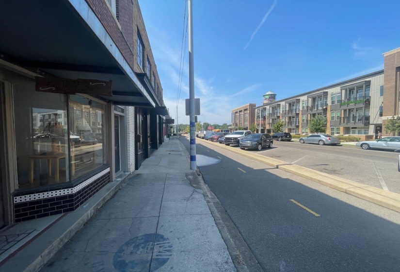 View of road featuring curbs and sidewalks