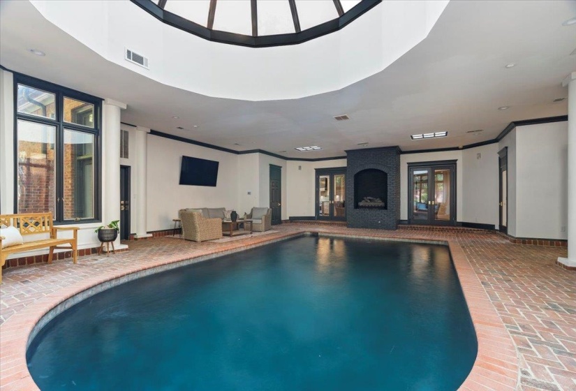 Indoor pool with french doors
