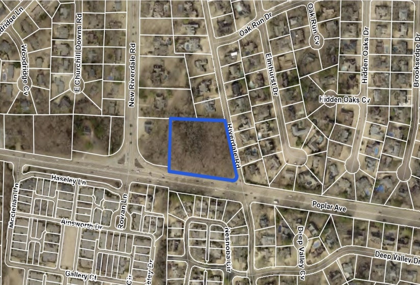 Aerial map of property and surrounding area featuring property boundaries highlighted