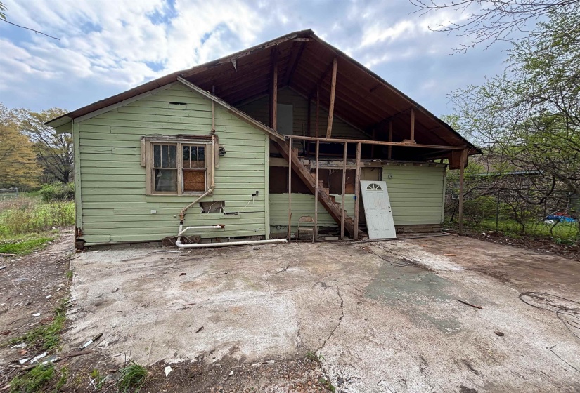 Rear view of house with a patio