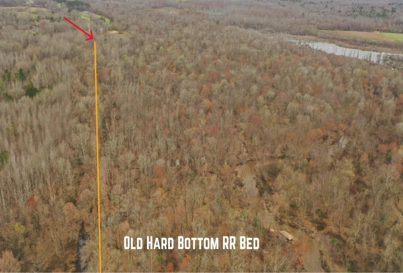 Currently, the neighbor allows the seller to access the property via an old hard bottomed rail road bed on the north end.