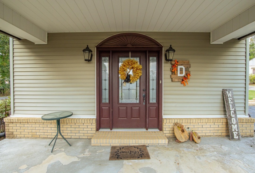 Property entrance with a porch
