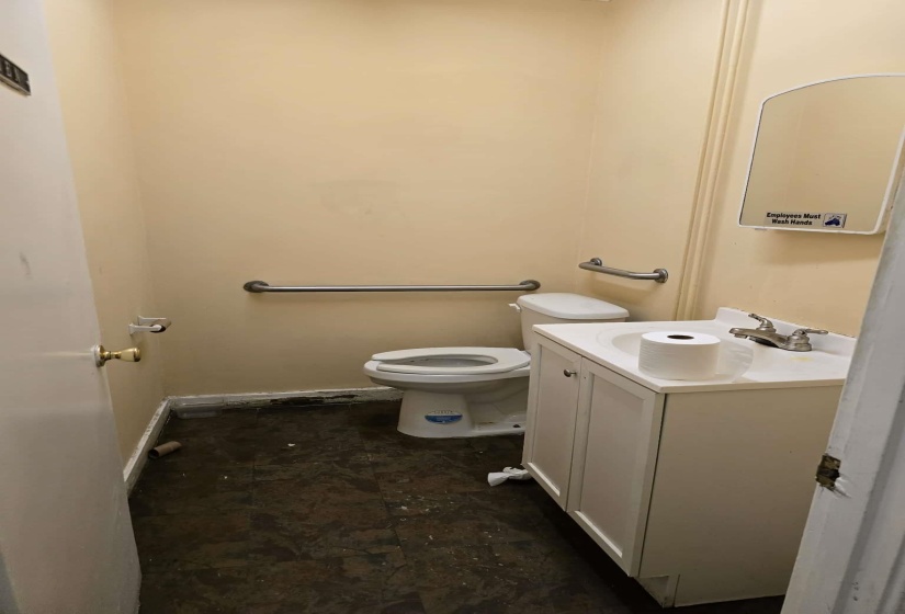 Bathroom with toilet and vanity