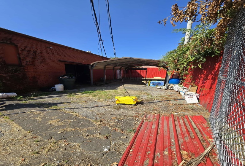 View of yard featuring a detached carport