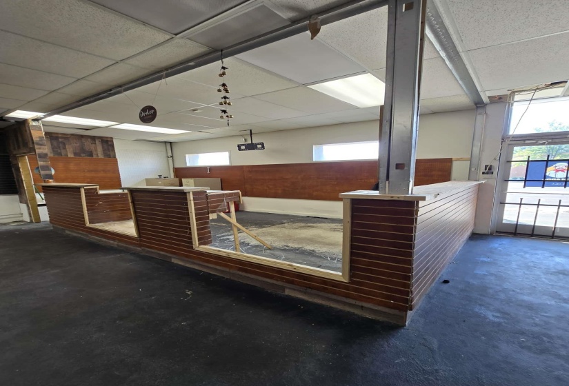 Welcome area featuring a drop ceiling