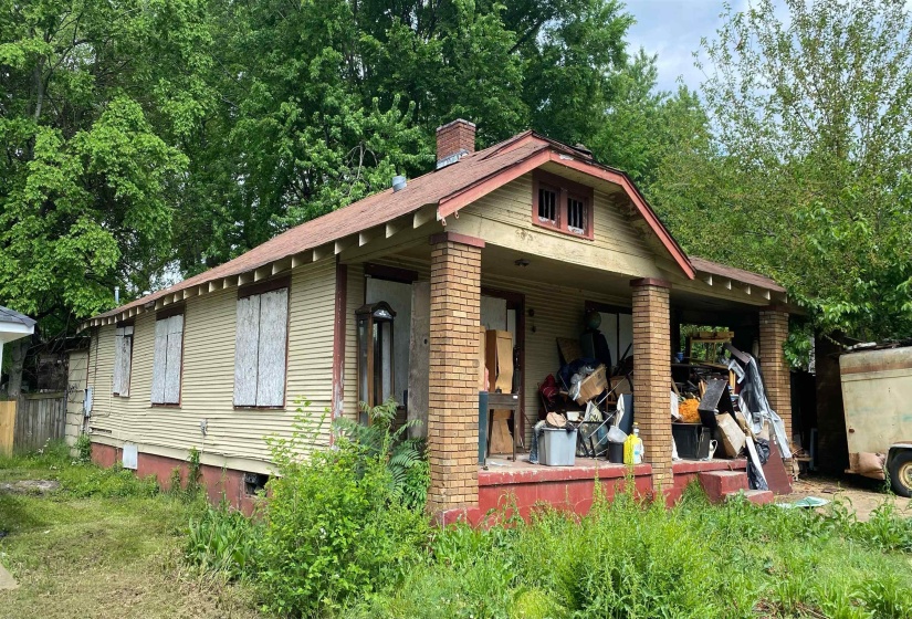 View of front of property with a chimney
