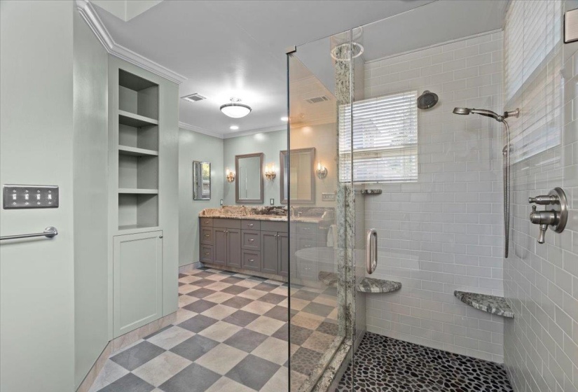 Full bath featuring crown molding, a stall shower, vanity, built in features, and tile patterned floors