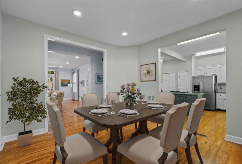 Dining space featuring recessed lighting and light wood-style flooring