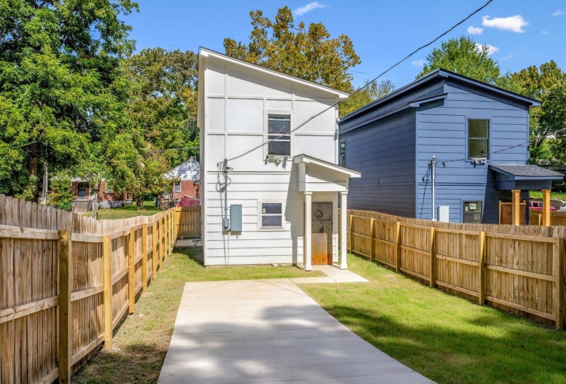 Back of house featuring a fenced backyard