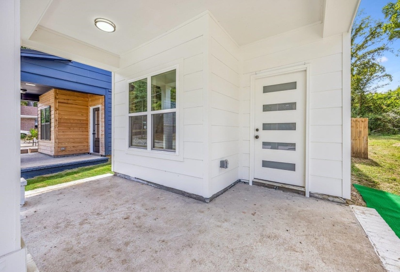 Doorway to property with a patio