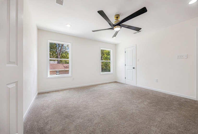 Unfurnished room with light carpet, recessed lighting, and ceiling fan