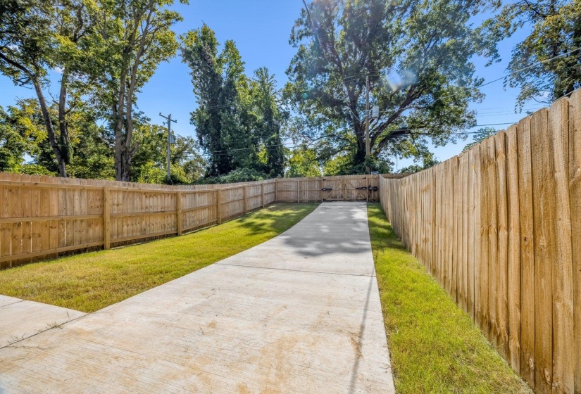 View of fenced backyard