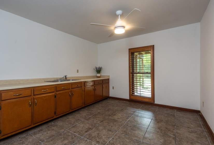 The walkout basement could be used as an in-law/teen suite or as rental income, has area for a kitchen, washer/dryer hookups, bedroom, bathroom, huge den. There is also an electric stair lift to get to main level.