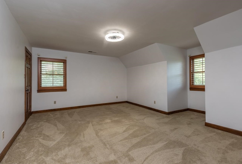 The second bedroom upstairs. with a large 20' storage closet.
